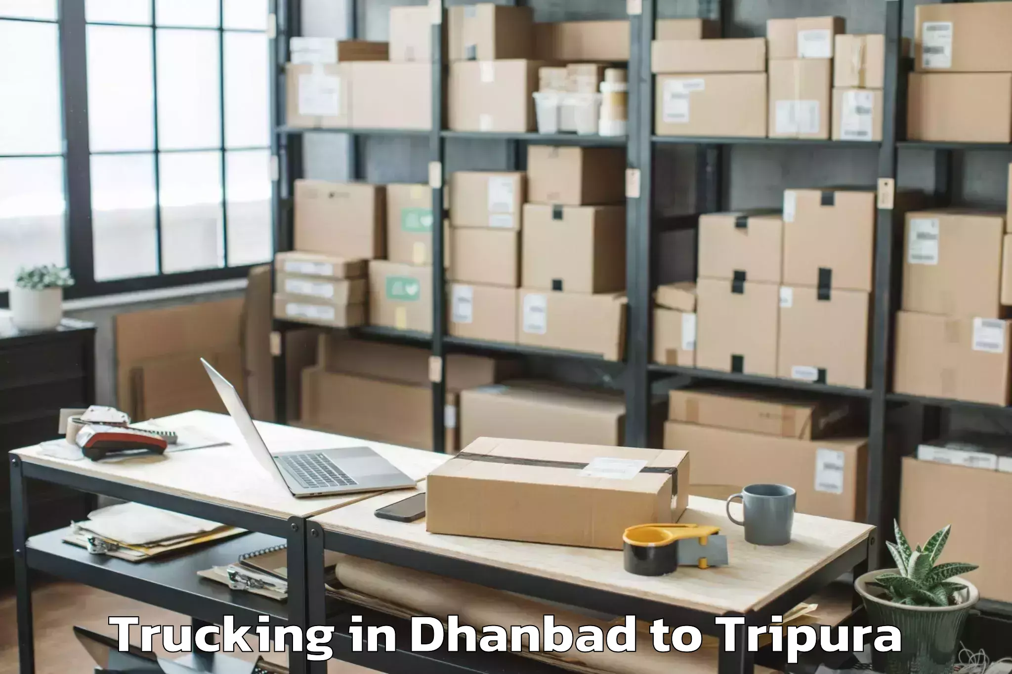 Book Dhanbad to Jampuijala Trucking Online